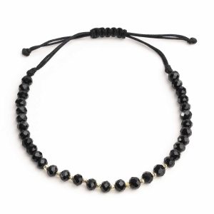 Bratara reglabila cu bile de aur si cristale negre fatetate